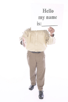 3 Ways to Overcome Face to Face Networking Awkwardness represented by a person holding a sign that says "hello, my name is"