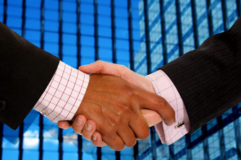 shaking hands after hiring a new employee