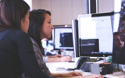 Women looking at a computer