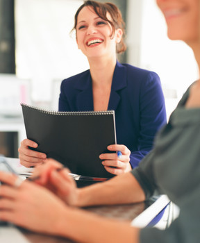 a woman getting advice on how to avoid a mid-career stall