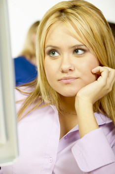 woman thinking about out of date HR programs