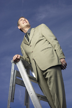 a job seeker climbing a career ladder