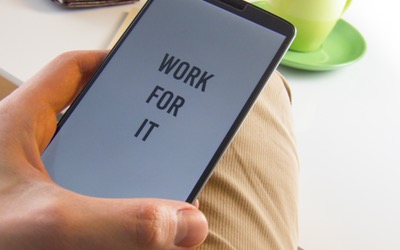 a smartphone that says "work for it"