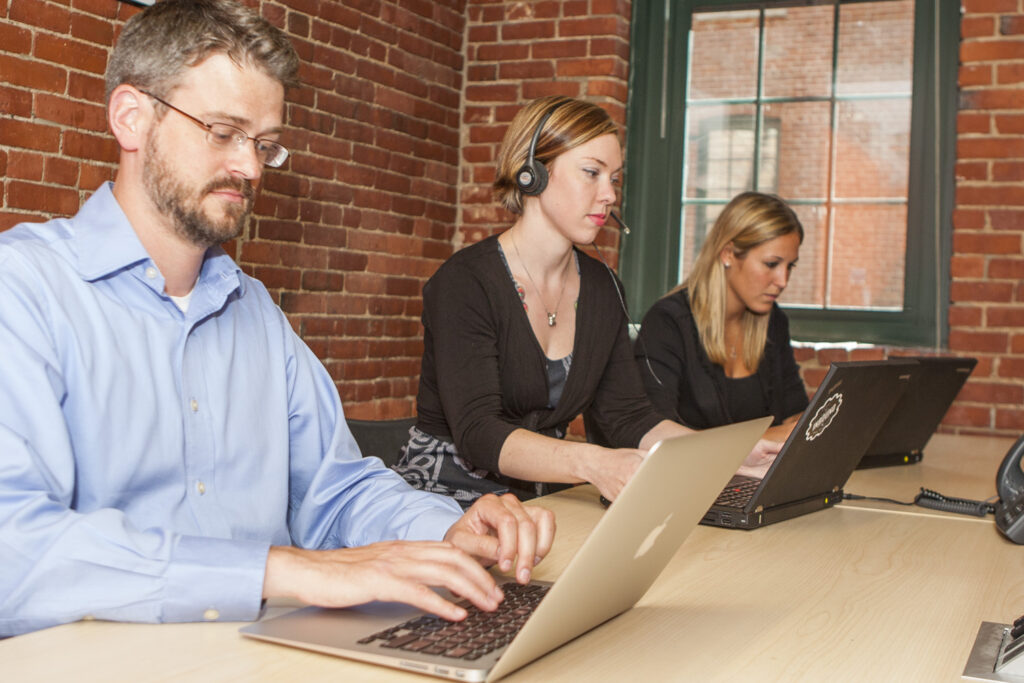 A millennial in an office meeting