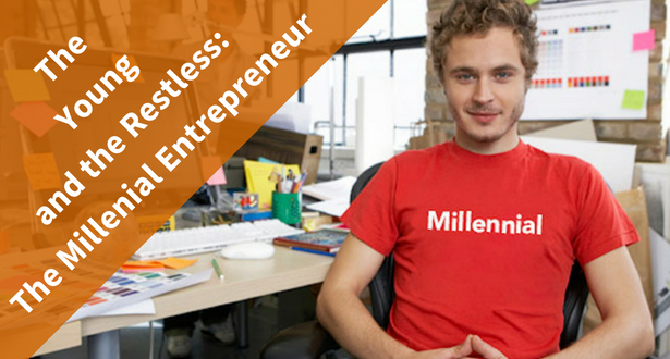 Man with millennial t shirt smiling at a desk