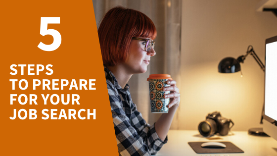 Woman drinking coffee in front of her computer