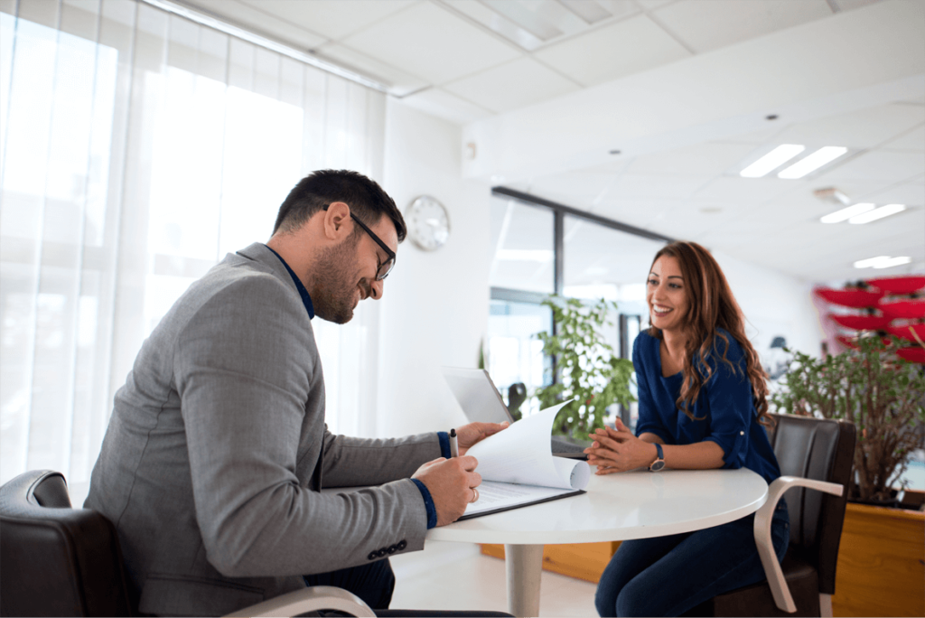 People in office interviewing